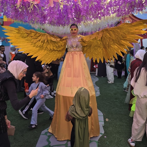 Gold Wings Stilt Walker